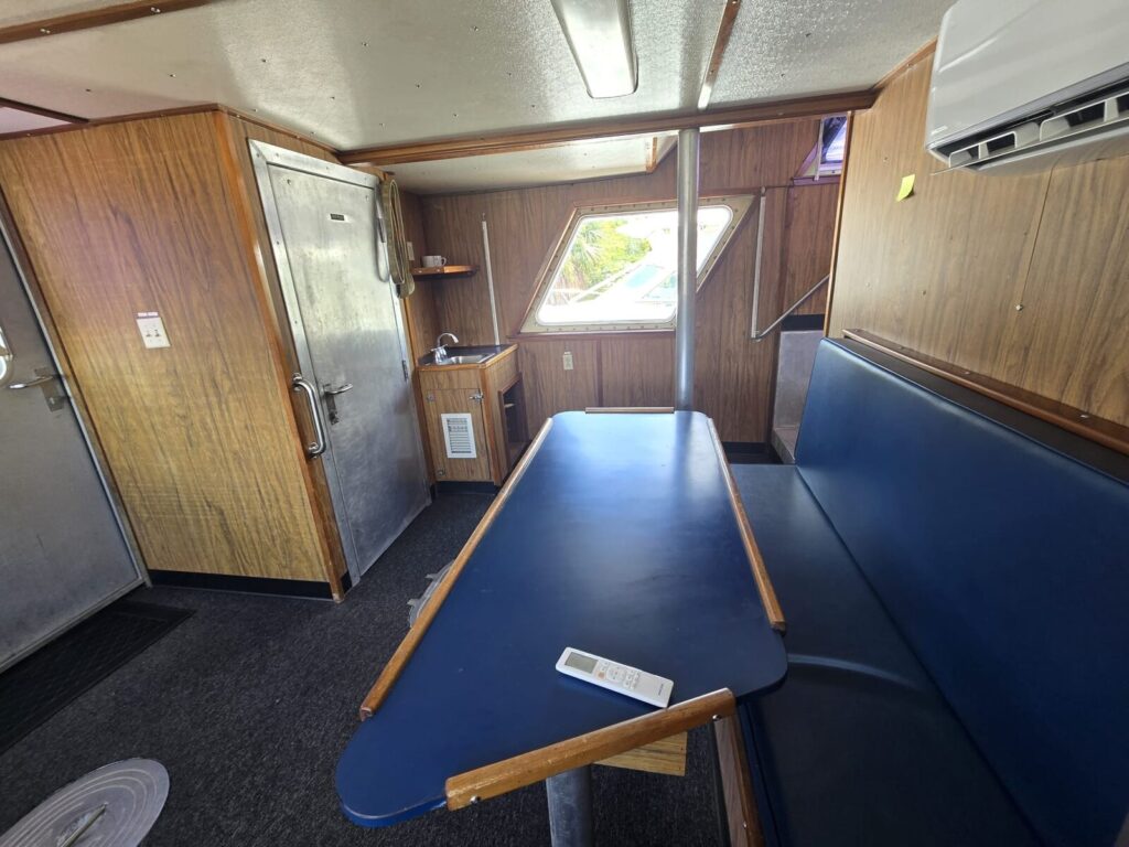 Galley area with extra workstations and power outlets